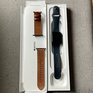 Series 7 Apple Watch. Midnight Aluminum Case. 45mm. Extra brown leather band.